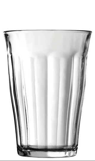 Clear glass tumbler on a white background